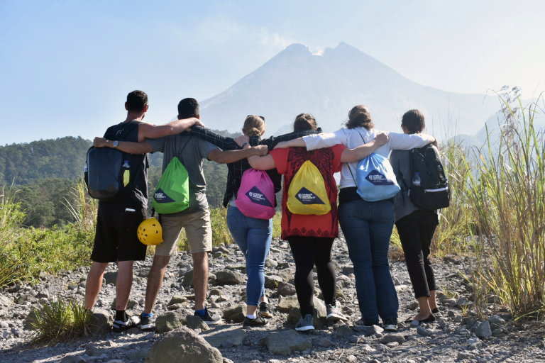 Group of people looking at a mountain