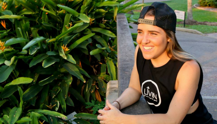 CDY Student Bridie  smiling in her LIVIN hat 
