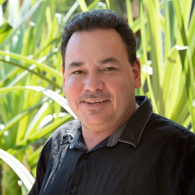 Dr Curtis Roman smiling