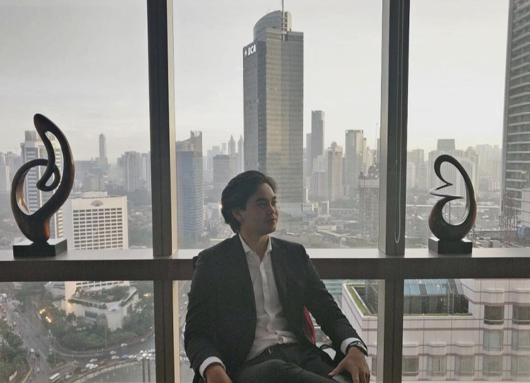 CDU student Max Stretton against the backdrop of a big city