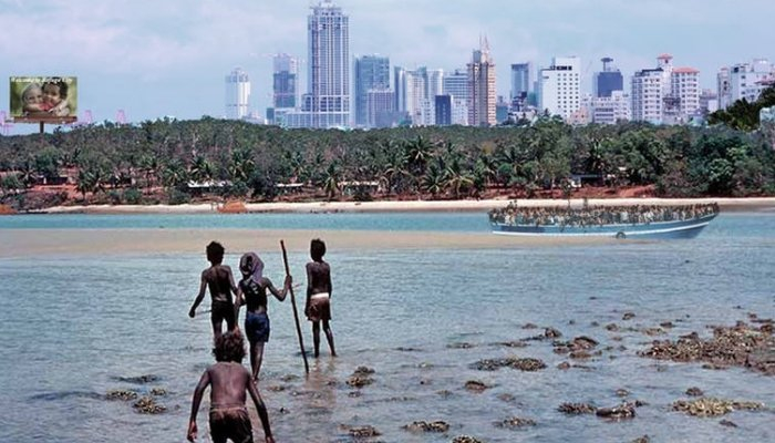 Montage image of refuge city conceptualised by CDU lecturer Ken Parish showing high rises in the background and Indigenous Australians in the foreground