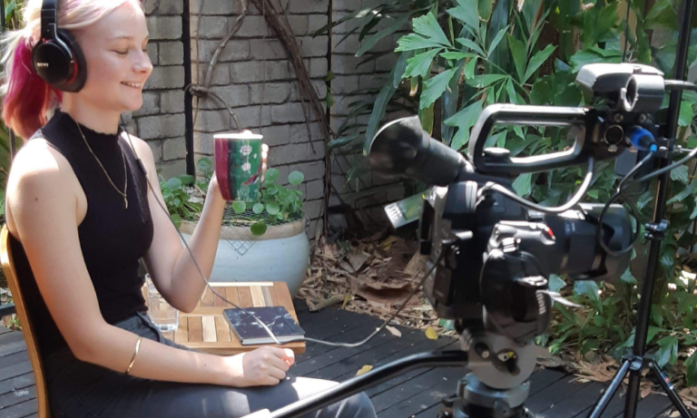 CDU student Ashleigh Abram in front of the camera