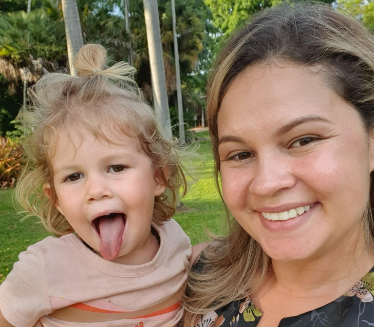CDU student Joelene and her daughter Darcy smiling at the camera