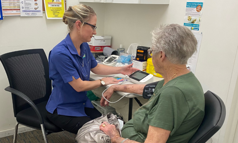 Pharmacy student Lauren helping her community