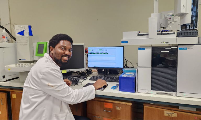 HDR student Caleb Ojo in the lab