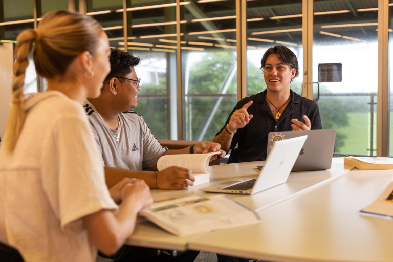 Students studying in library
