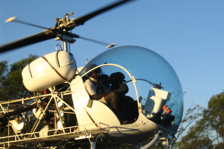people in helicopter