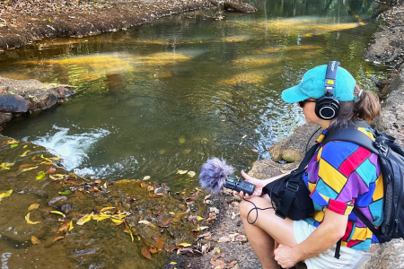 Researcher Jen Macdonald takes sound recordings of Rapid Creek waters