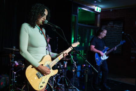 band on stage performing