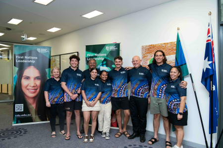 Indigenous Nationals team members pose with executives