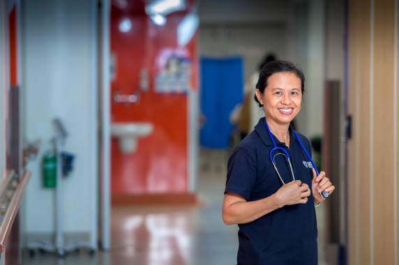 Nurse in hospital hallway