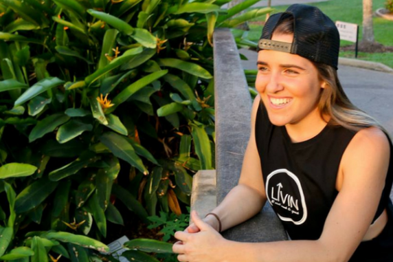 CDY Student Bridie  smiling in her LIVIN hat 