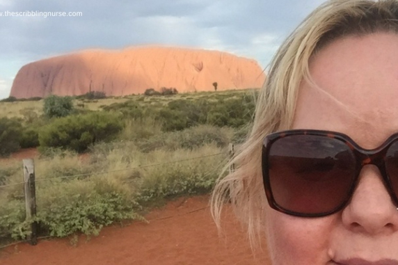 Rachel Ashton with Uluru in the background
