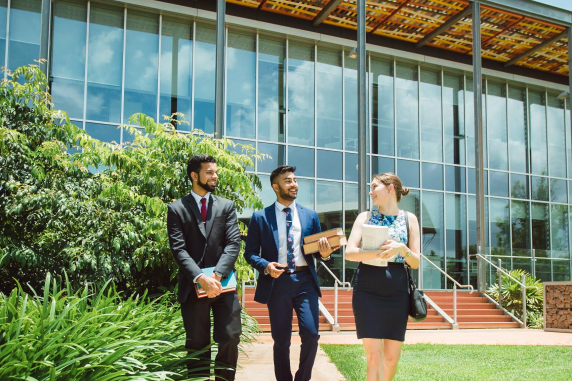 Students walking together in business/court attire