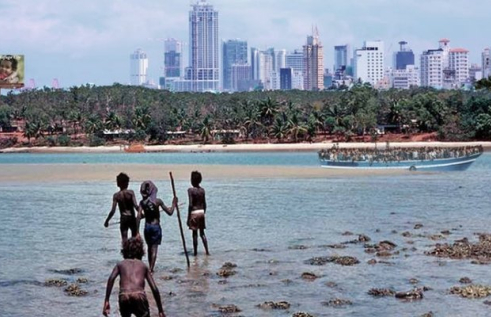 Montage image of refuge city conceptualised by CDU lecturer Ken Parish showing high rises in the background and Indigenous Australians in the foreground