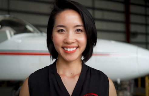 Ellie smiling to camera