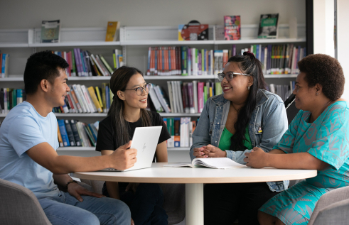 students sitting around a table at sydney campus